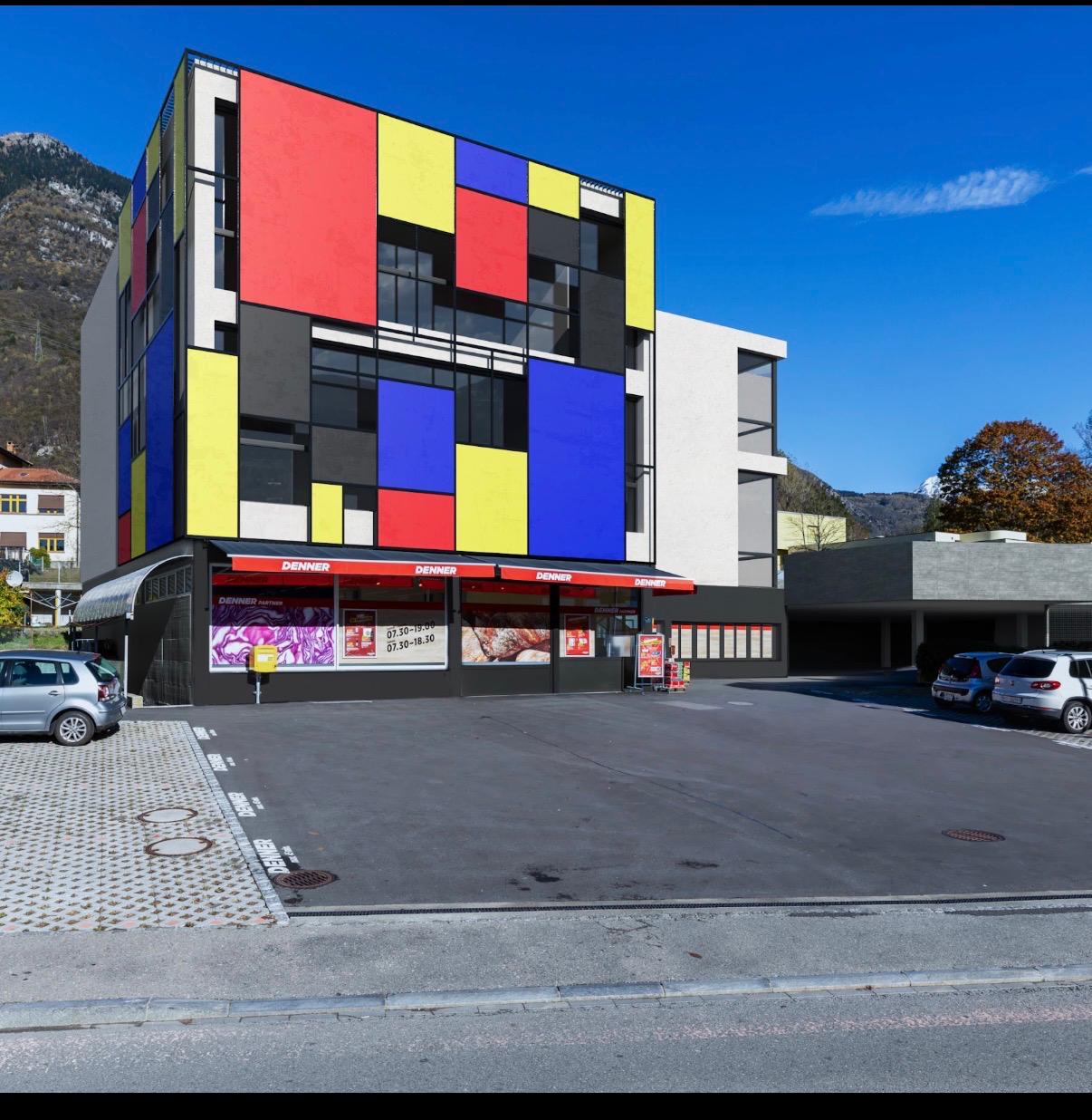 Il Centro Opti a Lumino: l'edificio con la facciata colorata dove apre THI LAND, sopra il supermercato Denner